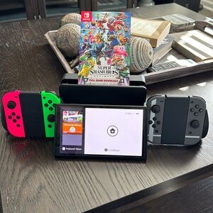 NINTENDO SWITCH OLED BUNDLE - BLACK